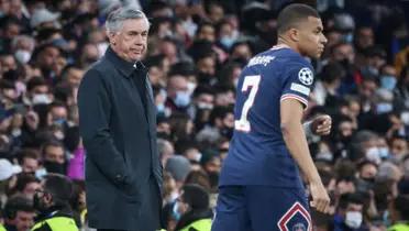 Ancelotti y Mbappé cuando se enfrentaron el Madrid y el PSG en Champions. (Foto: Le Parisien)