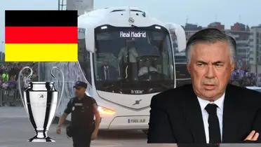 Bus del Real Madrid, Ancelotti preocupado. Trofeo de Champions League y bandera alemana.