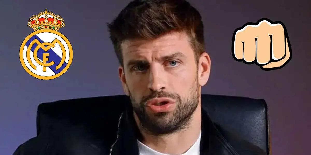 Piqué hablando en una entrevista. Escudo del Real Madrid y puño cerrado.