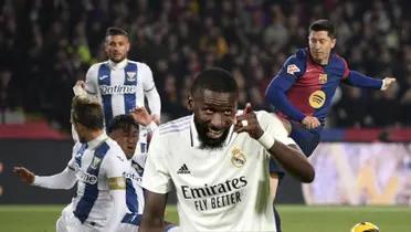 Robert Lewandowski - Antonio Rudiger (Foto: FC Barcelona)