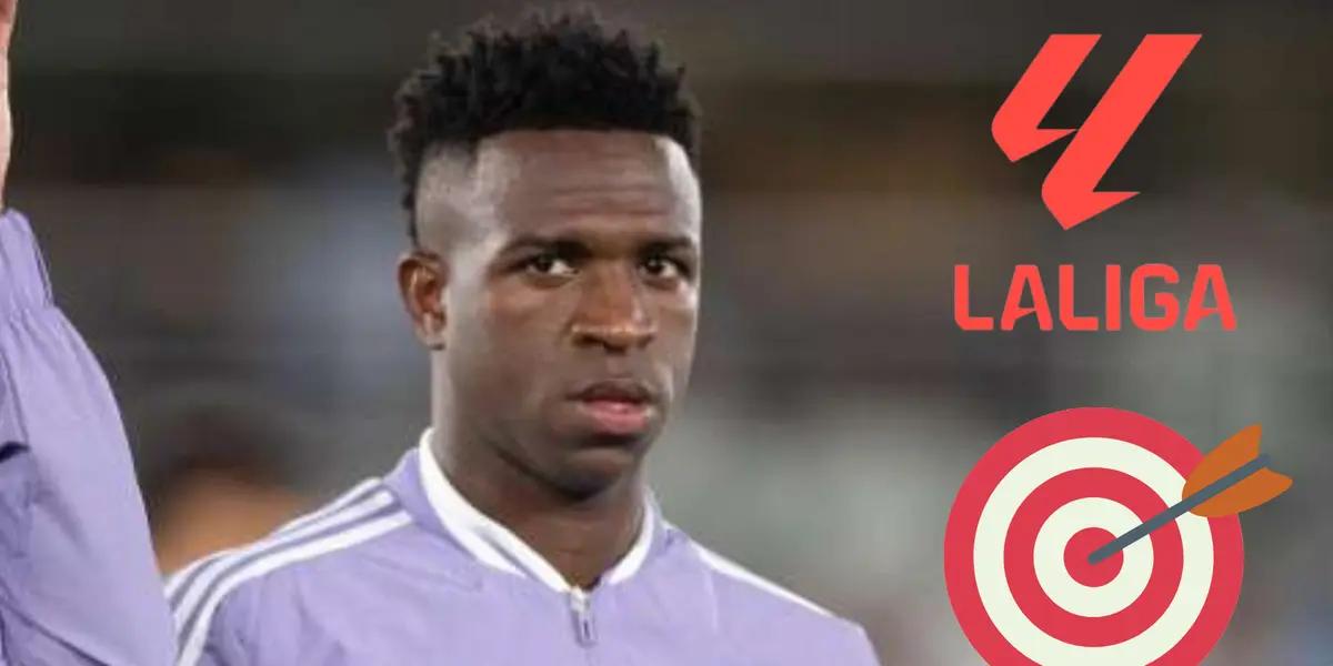 Vinicius mirando seriamente. Logo de La Liga y por debajo un dardo.
