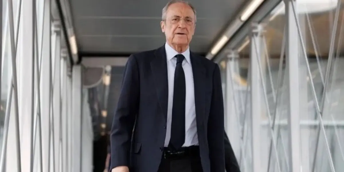 Florentino Perez looks serious as he walks from the airport.